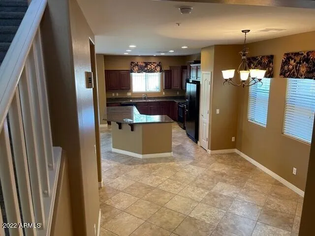 a view of kitchen and windows