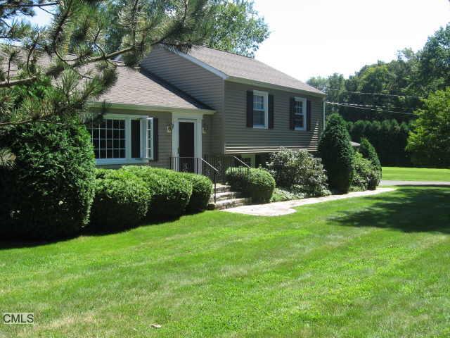 67 Walnut Hill Road Bethel, CT 06801 - Photo 1 of 1 a view of a house with a yard and a garden