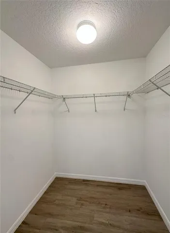 a view of a room with racks on the wall