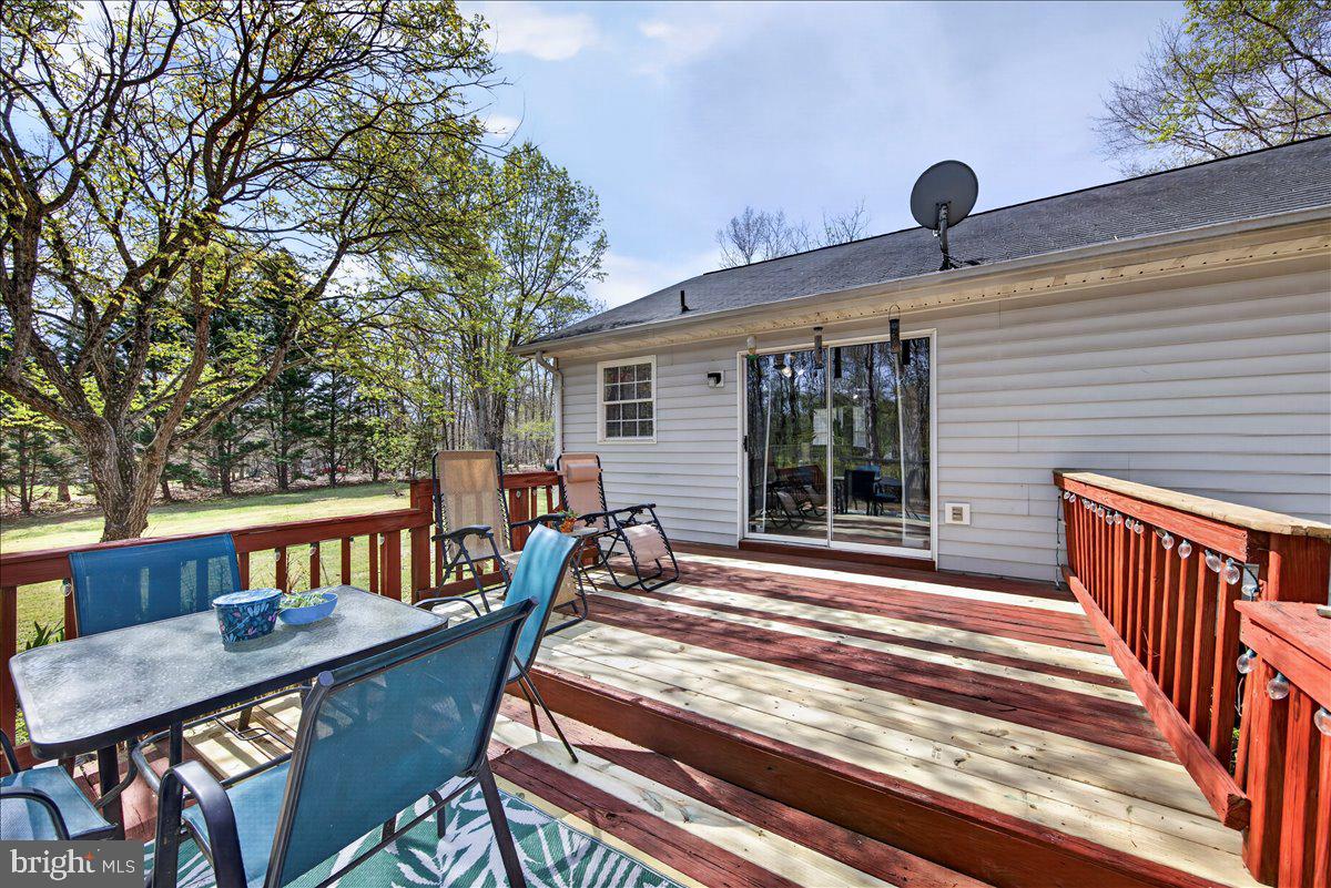 6265 Browning Road Culpeper, VA 22701 - Photo 42 of 74 a view of a patio with a table and chairs