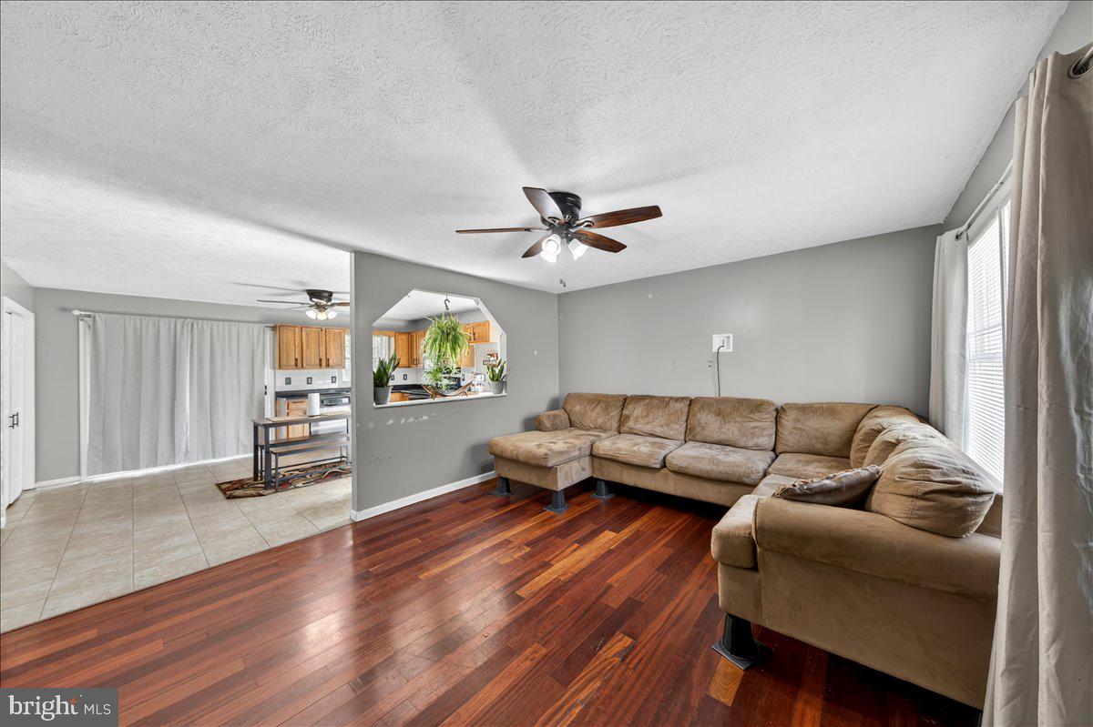 6265 Browning Road Culpeper, VA 22701 - Photo 5 of 74 a living room with furniture and a wooden floor