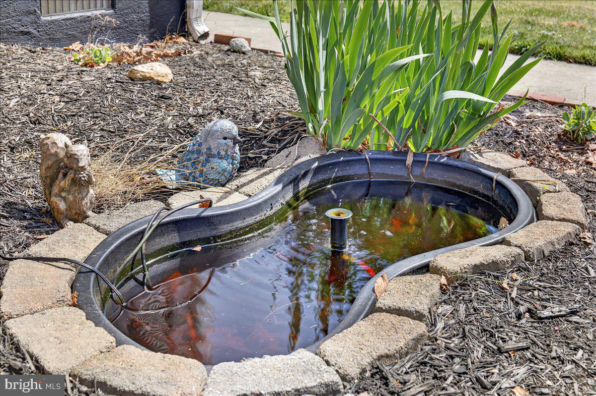 6265 Browning Road Culpeper, VA 22701 - Photo 56 of 74 a view of a backyard with sitting area