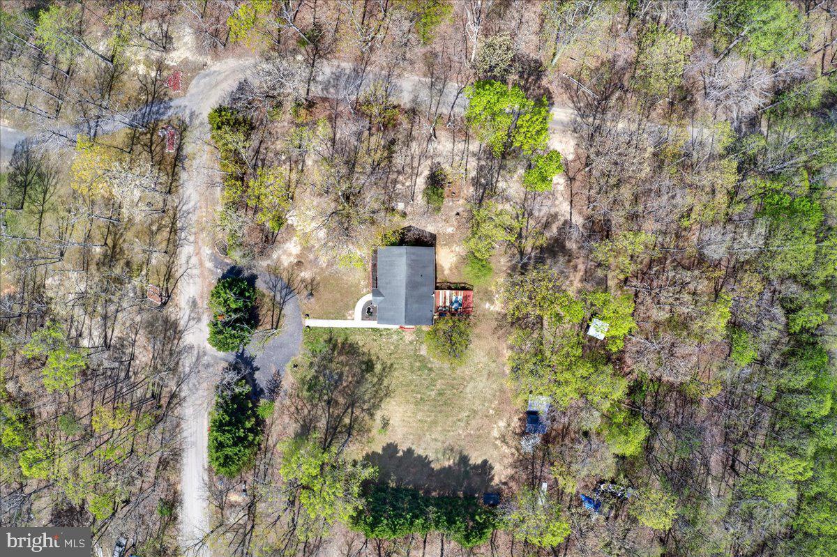 6265 Browning Road Culpeper, VA 22701 - Photo 64 of 74 a aerial view of a house with a yard and garden