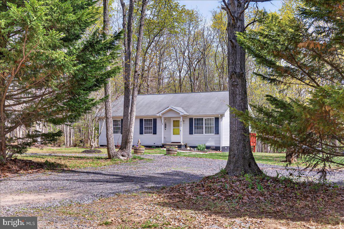 6265 Browning Road Culpeper, VA 22701 - Photo 71 of 74 front view of a house with a yard