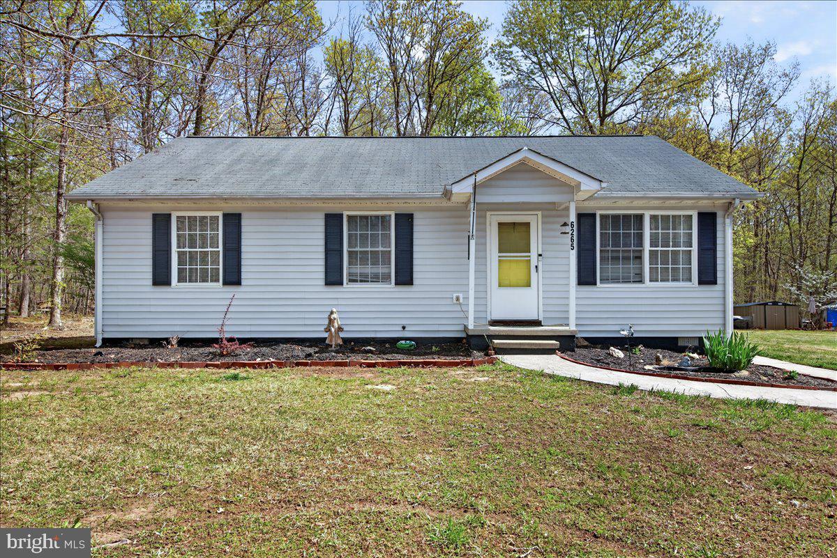 6265 Browning Road Culpeper, VA 22701 - Photo 74 of 74 a front view of a house with a yard
