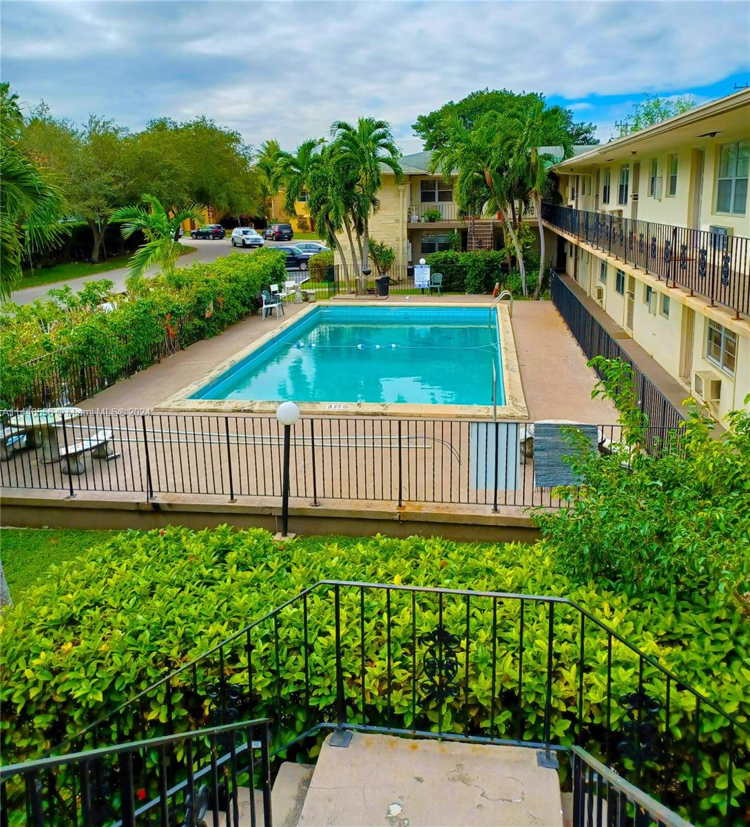 1755 Northeast 116th Road, Unit 9 North Miami, FL 33181 - Photo 24 of 27 a view of a garden with staircase