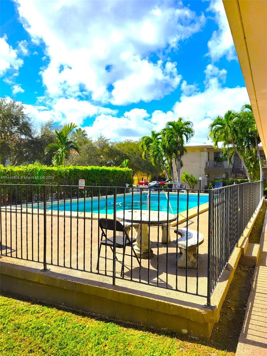 1755 Northeast 116th Road, Unit 9 North Miami, FL 33181 - Photo 26 of 27 a view of a balcony