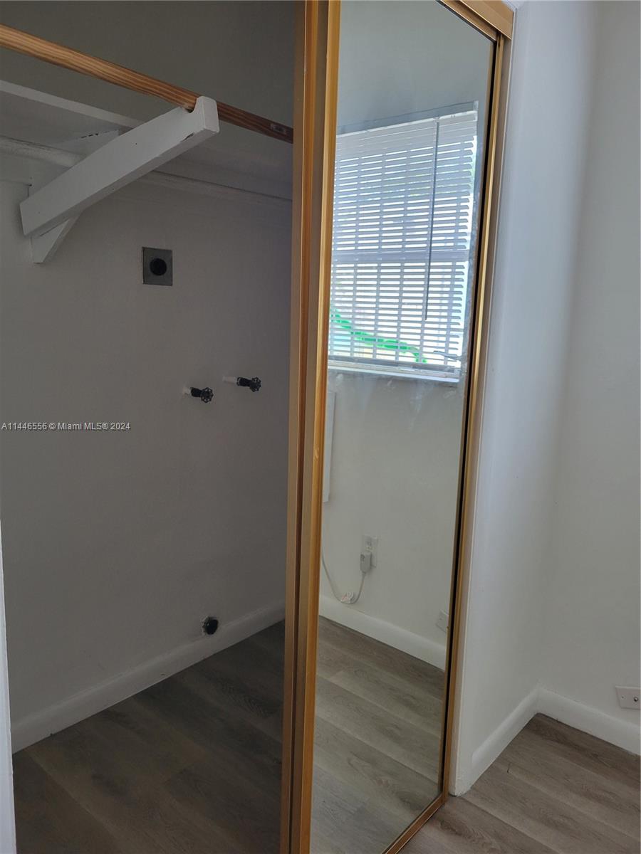 1755 Northeast 116th Road, Unit 9 North Miami, FL 33181 - Photo 10 of 27 a view of an empty room