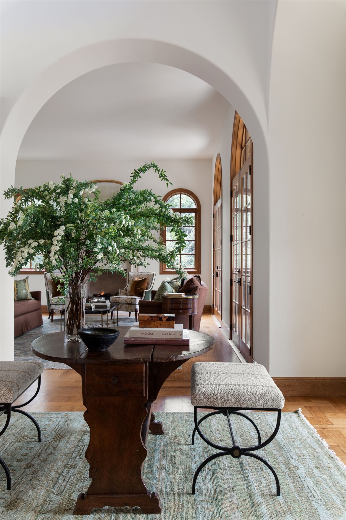 600 Logans Lane Austin, TX 78746 - Photo 10 of 39 a living room with furniture chess floor and a large window