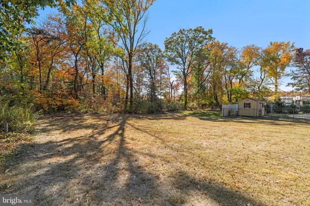 a view of yard covered with snow