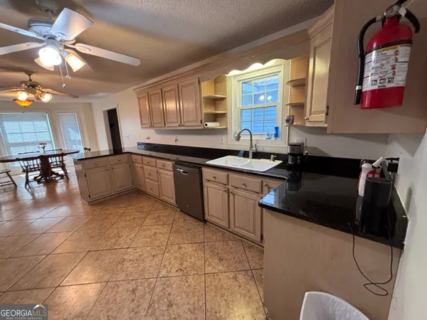 a bathroom with bathtub and shower