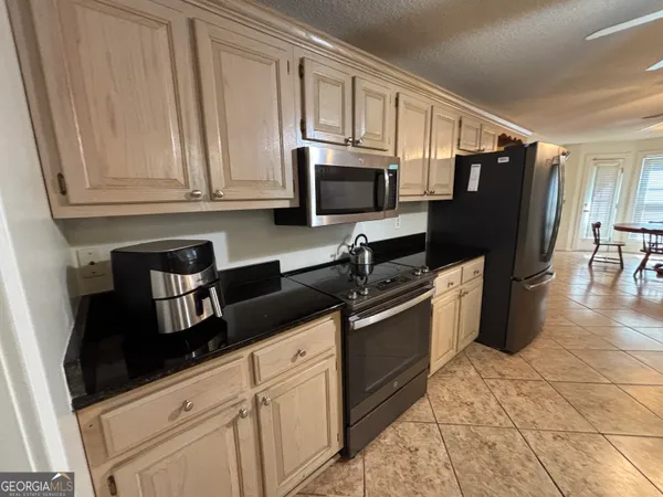 a bathroom with a tub and a shower