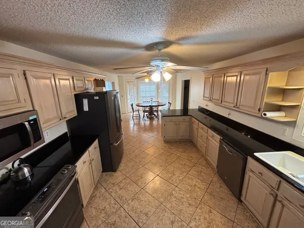 a view of a room with racks on the wall