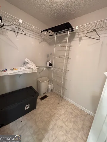 a view of an house with backyard space and garden