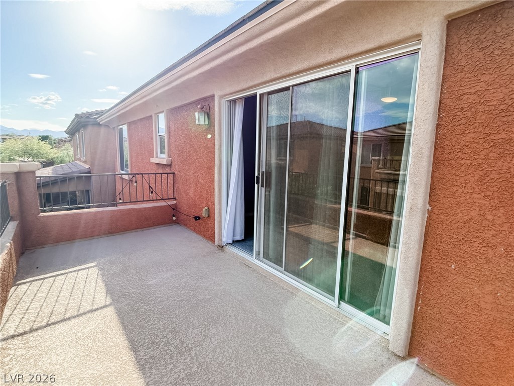 8683 Moreno Mountain Avenue Las Vegas, NV 89178 - Photo 20 of 26 Unwind outdoors with a private patio space and sliding glass door access.