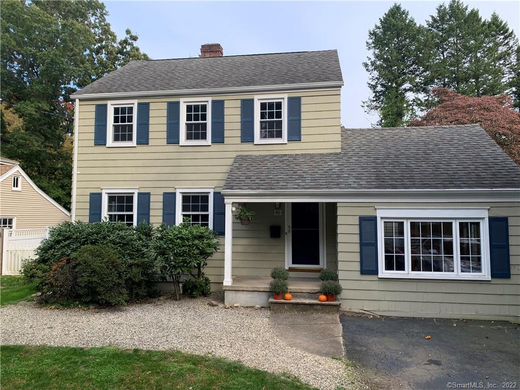 Welcoming 3 bedroom 1 1/2 bath Colonial on quiet street, yet convenient to everything!