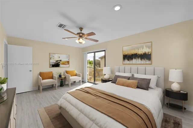 a bedroom with a bed and a couch