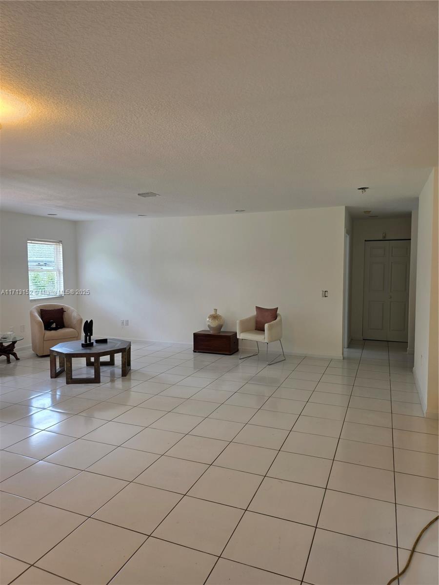 14630 Southwest 148th Court Miami, FL 33196 - Photo 4 of 15 a view of work space with windows