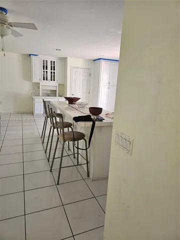 a view of a livingroom with furniture and window