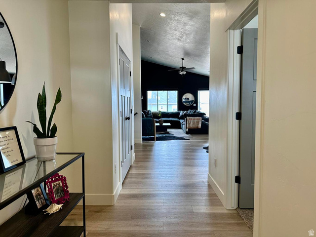 4349 Half Mile Road East Enoch, UT 84721 - Photo 13 of 36 Hall with light wood-style flooring and recessed lighting