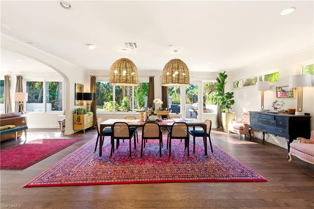 4630 11th Avenue Southwest Naples, FL 34116 - Photo 16 of 50 a view of a living room and dining room