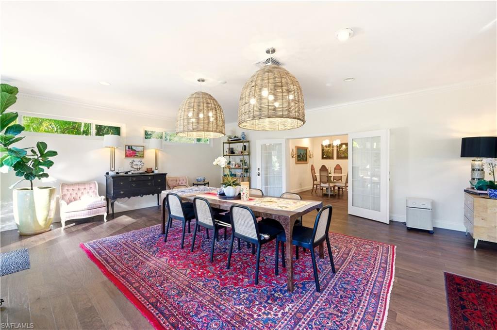 4630 11th Avenue Southwest Naples, FL 34116 - Photo 19 of 50 a view of a dining room with furniture