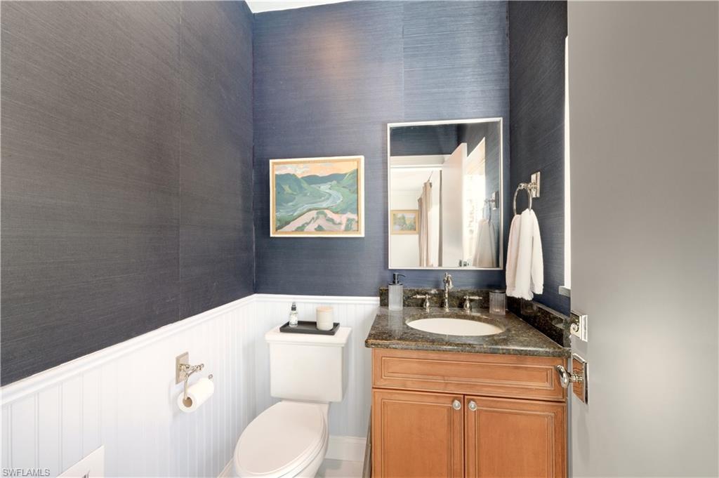 4630 11th Avenue Southwest Naples, FL 34116 - Photo 20 of 50 a room with a stove a sink and a window