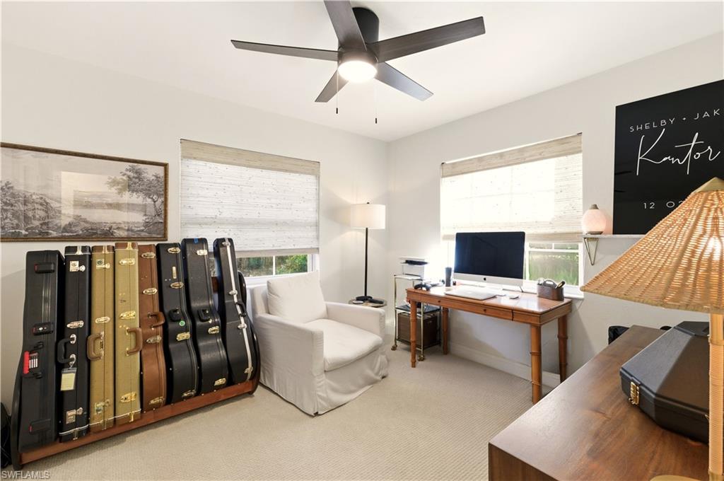 4630 11th Avenue Southwest Naples, FL 34116 - Photo 31 of 50 a view of a livingroom with workspace and a window