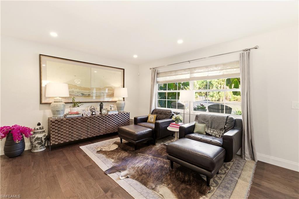 4630 11th Avenue Southwest Naples, FL 34116 - Photo 5 of 50 a bedroom with furniture and a large window