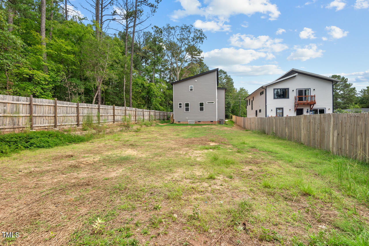 1010 Cook Road Durham, NC 27713 - Photo 54 of 64 The Backyard Facing the Front
