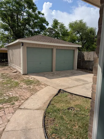 a view of backyard with green space