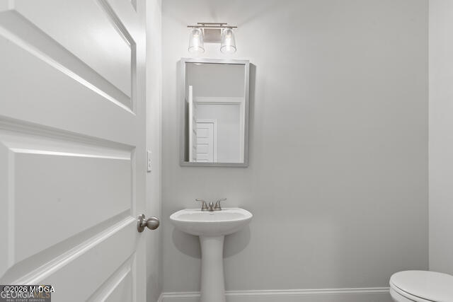 2910 Red Fox Drive Haddock, GA 31033 - Photo 24 of 46 Half bathroom