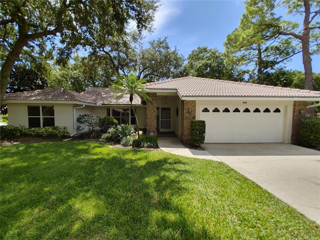 3610 Garden Lakes Ivy Bradenton, FL 34203 - Photo 1 of 1 a front view of a house with a yard