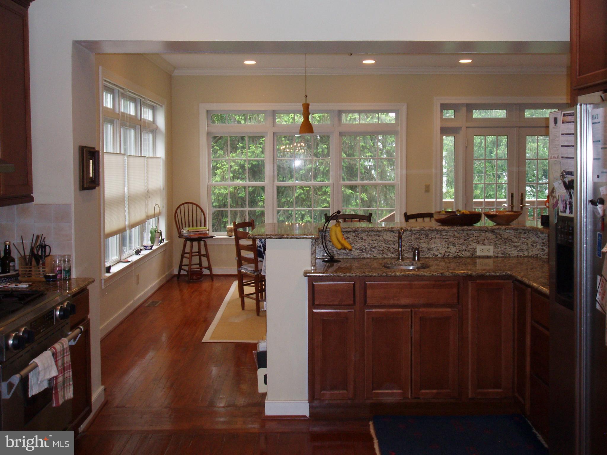 7208 Exfair Road Bethesda, MD 20814 - Photo 12 of 27 Kitchen to Family Room