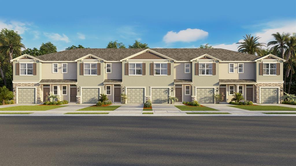 2476 Riversong Ldg Lane Wesley Chapel, FL 33543 - Photo 1 of 1 a front view of residential houses with street