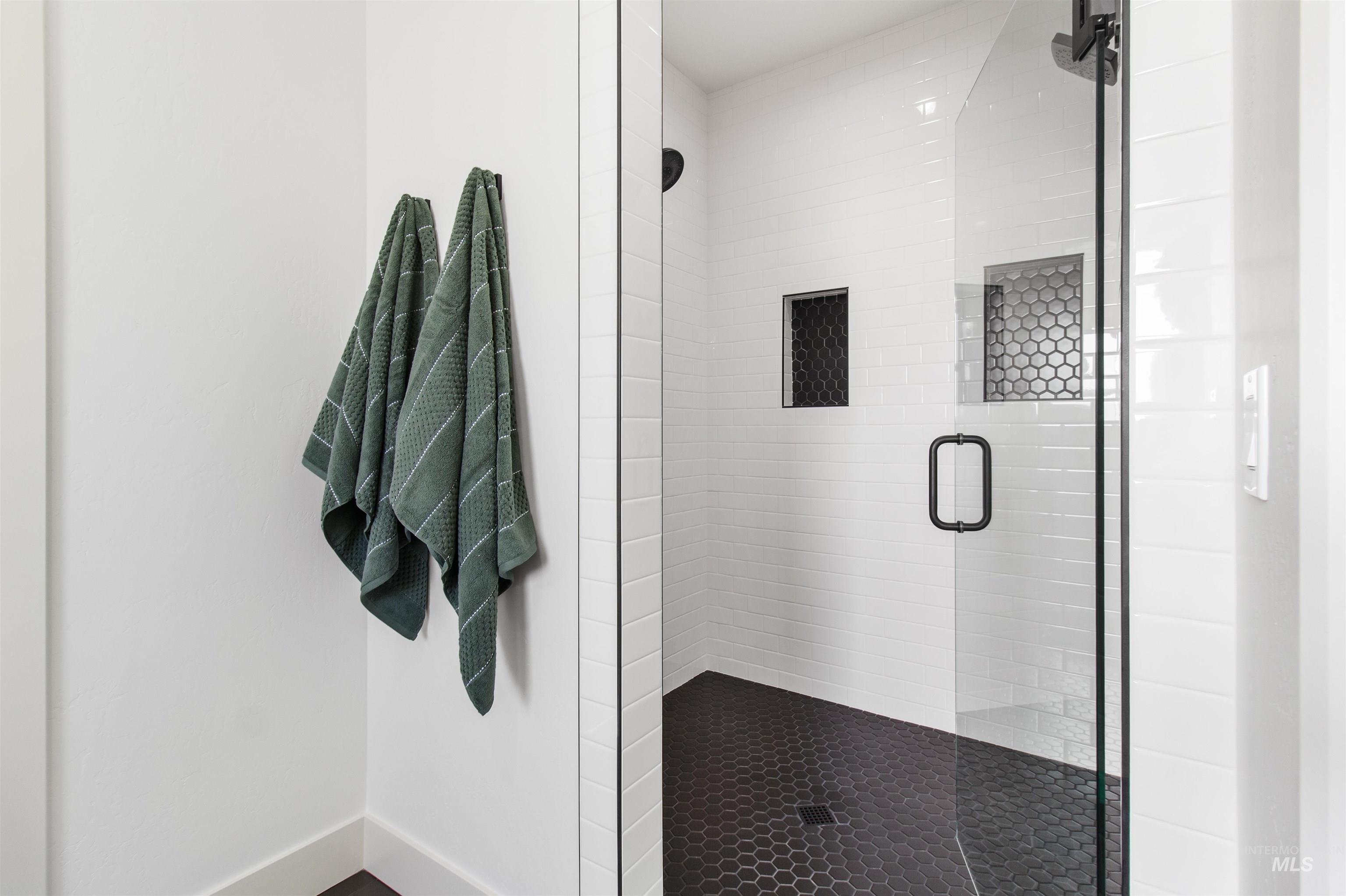514 Full Moon Way Twin Falls, ID 83301 - Photo 24 of 49 Full bathroom featuring a stall shower and baseboards