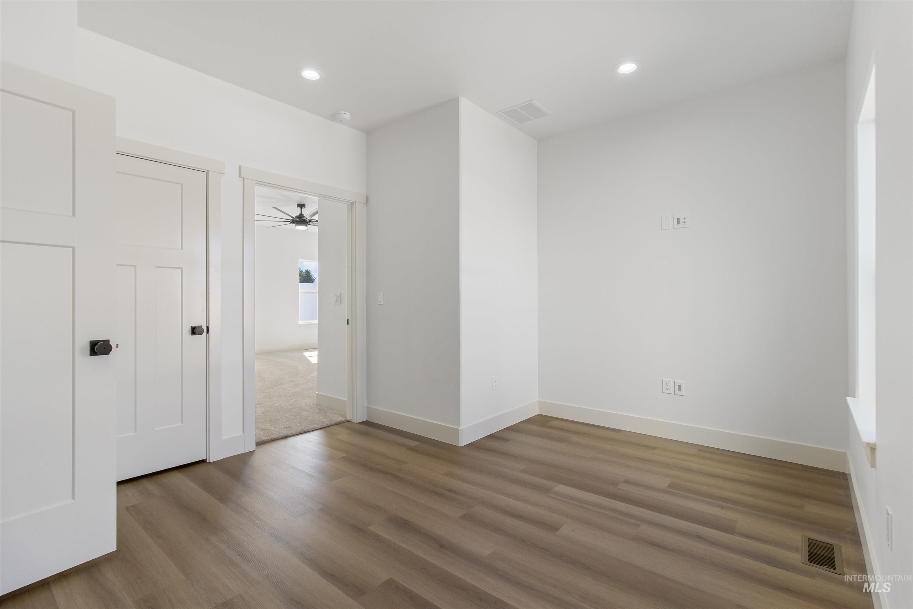 514 Full Moon Way Twin Falls, ID 83301 - Photo 25 of 49 Spare room with recessed lighting, wood finished floors, and ceiling fan