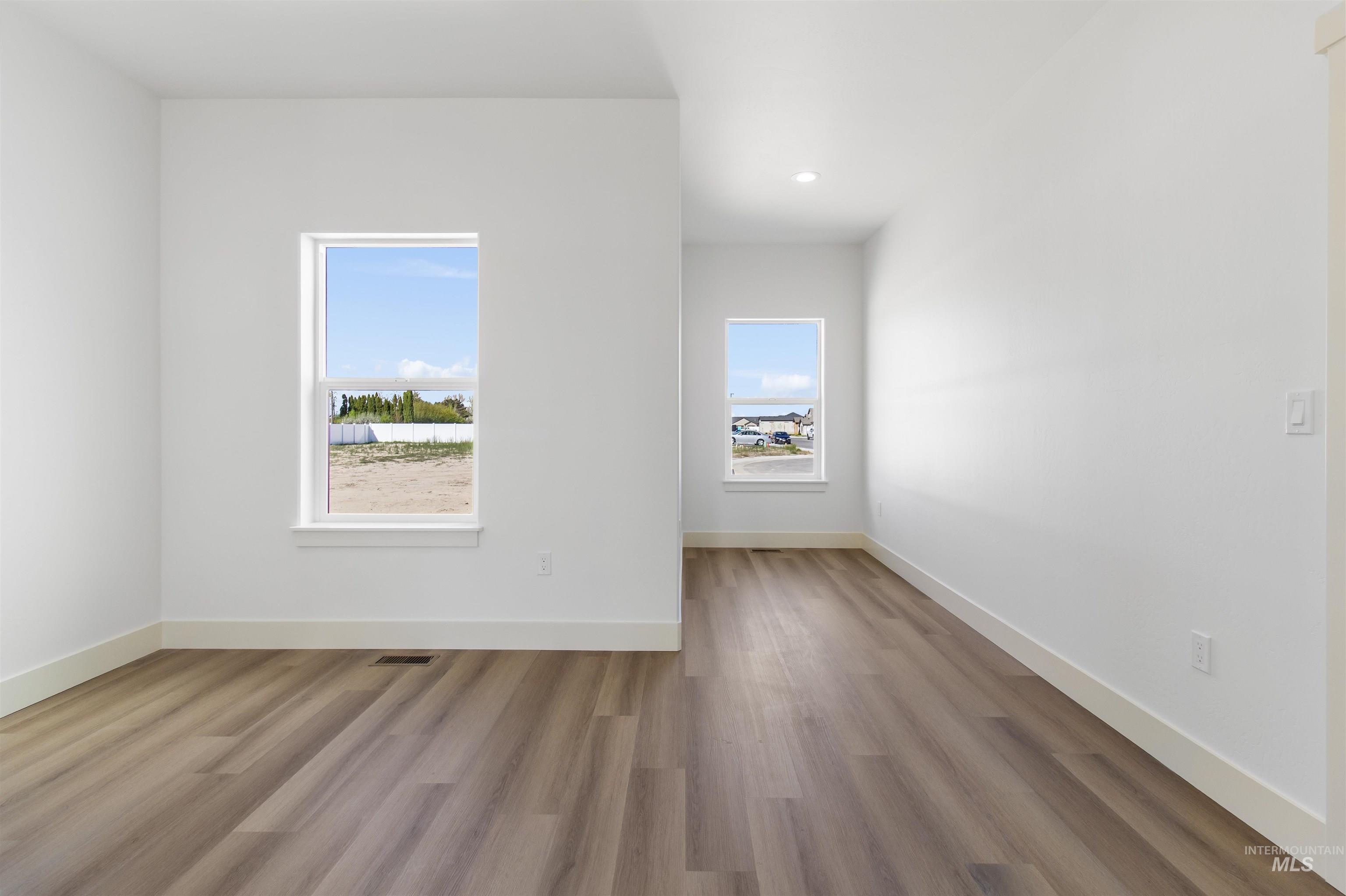 514 Full Moon Way Twin Falls, ID 83301 - Photo 27 of 49 Unfurnished room featuring light wood-style floors and recessed lighting