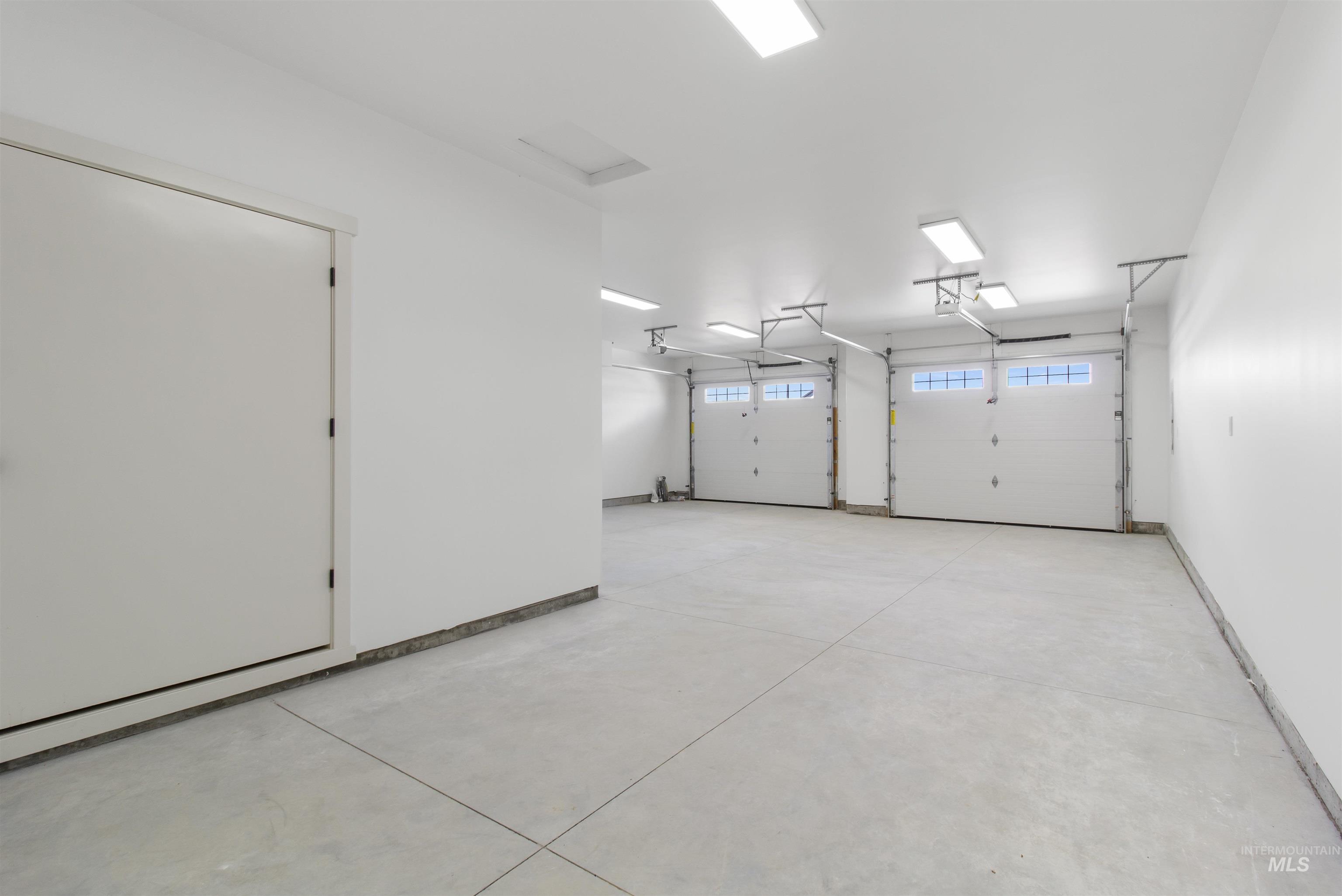 514 Full Moon Way Twin Falls, ID 83301 - Photo 40 of 49 Garage featuring baseboards
