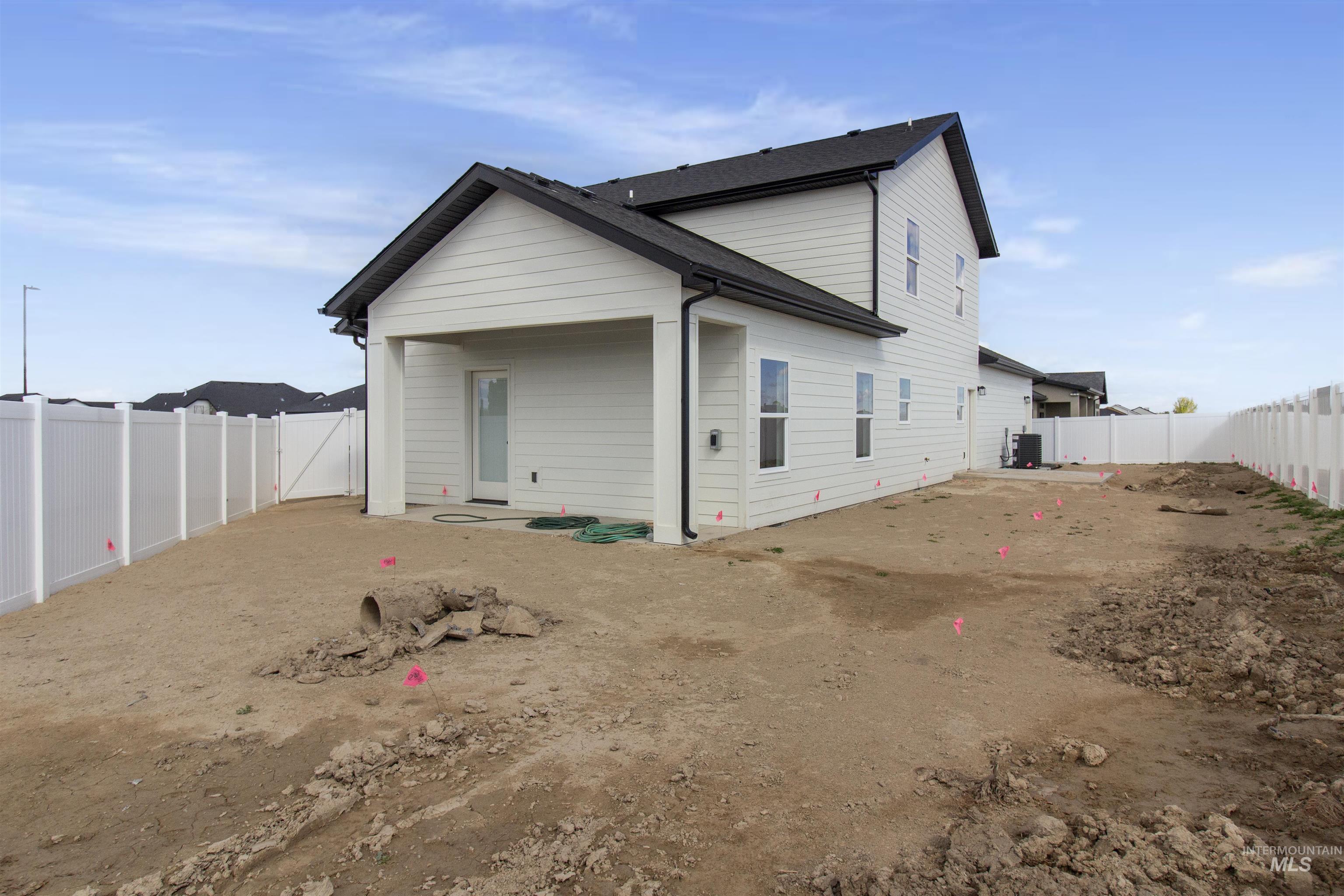 514 Full Moon Way Twin Falls, ID 83301 - Photo 41 of 49 Rear view of house with a fenced backyard