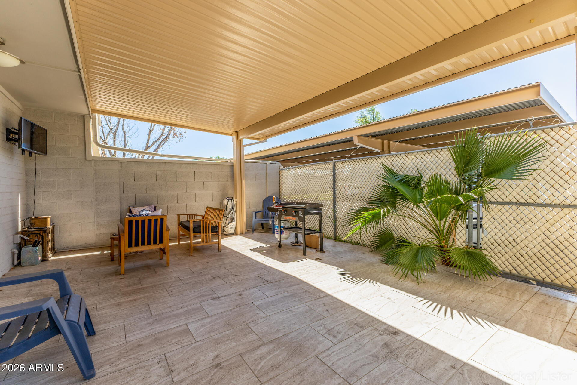 4923 North Granite Reef Road Scottsdale, AZ 85251 - Photo 20 of 28 a view of a chairs and table in the patio