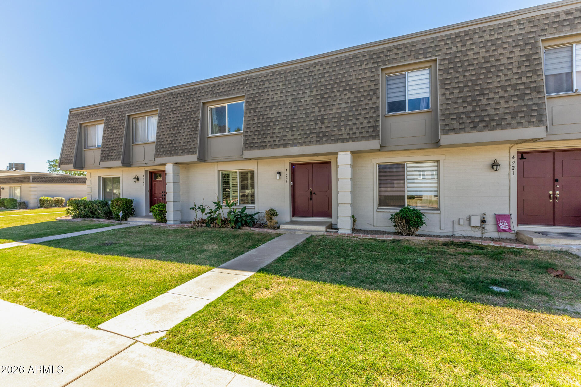 4923 North Granite Reef Road Scottsdale, AZ 85251 - Photo 2 of 28 a view of a house with swimming pool and a yard
