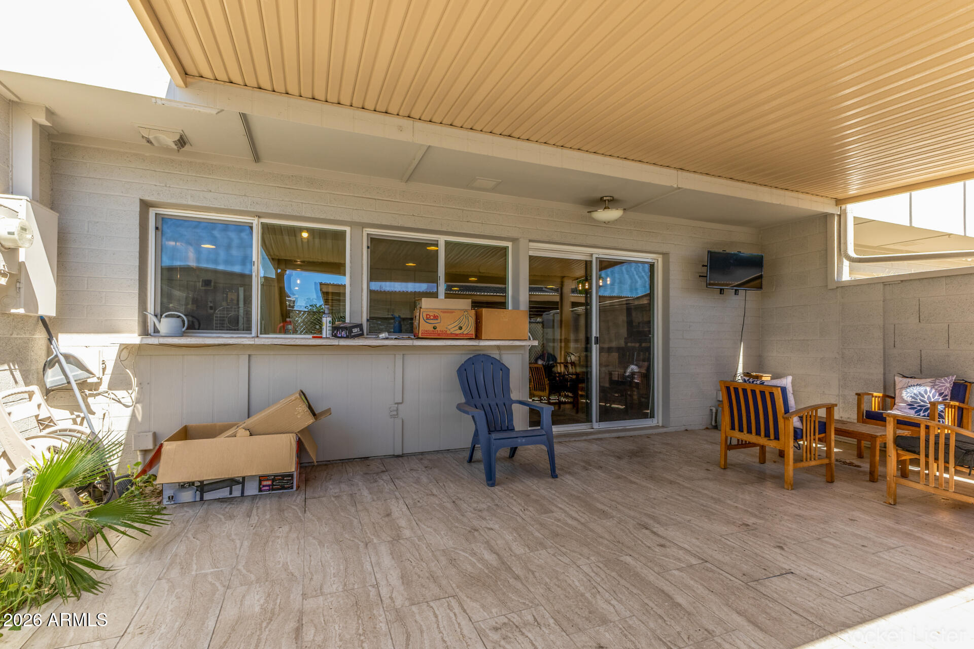 4923 North Granite Reef Road Scottsdale, AZ 85251 - Photo 22 of 28 a living room filled with furniture and a wooden floor