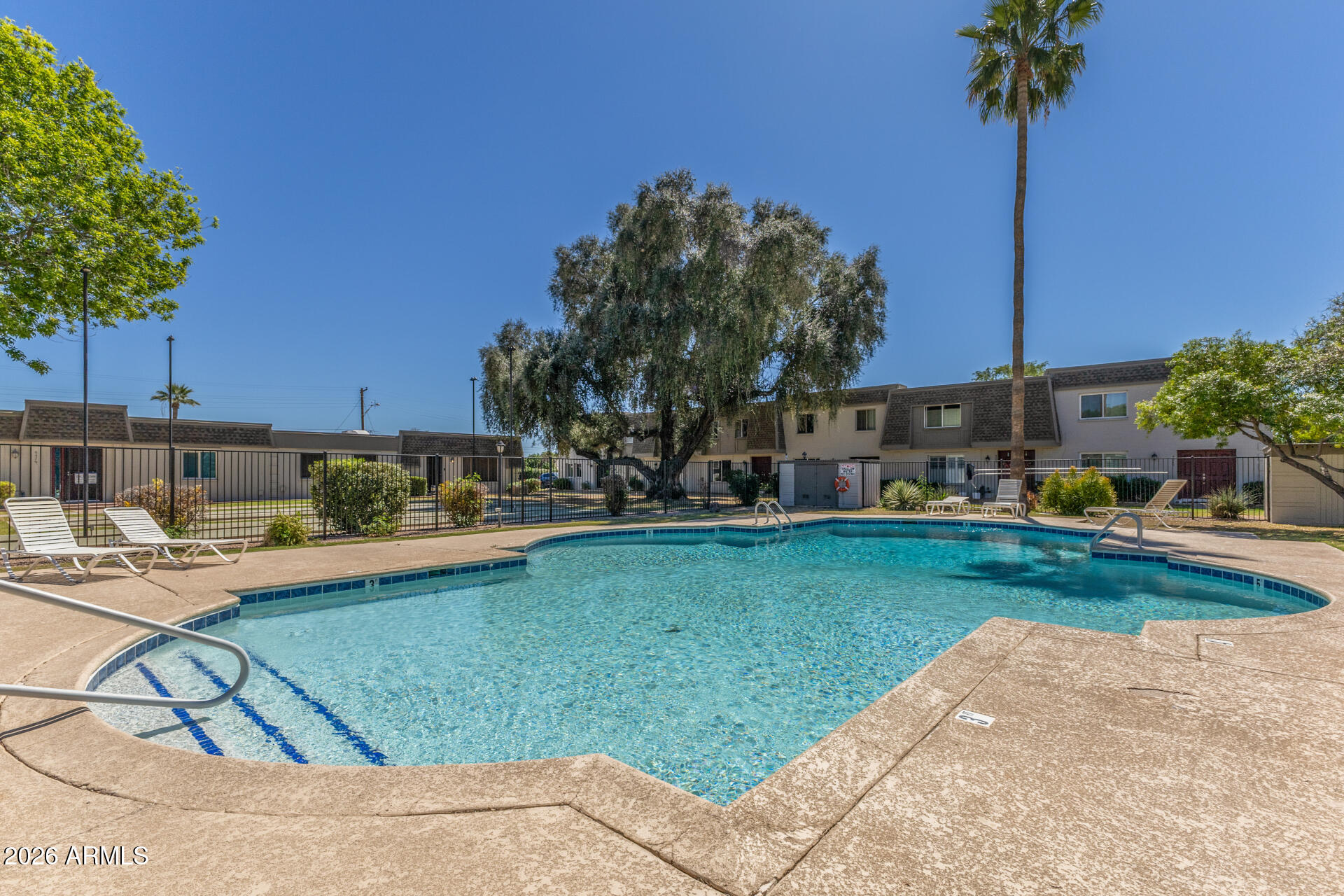 4923 North Granite Reef Road Scottsdale, AZ 85251 - Photo 24 of 28 a view of a garden with a slide