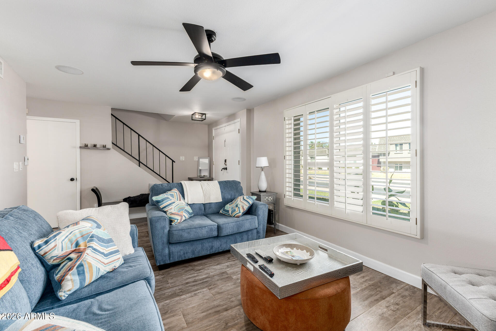 4923 North Granite Reef Road Scottsdale, AZ 85251 - Photo 5 of 28 a living room with furniture and a window
