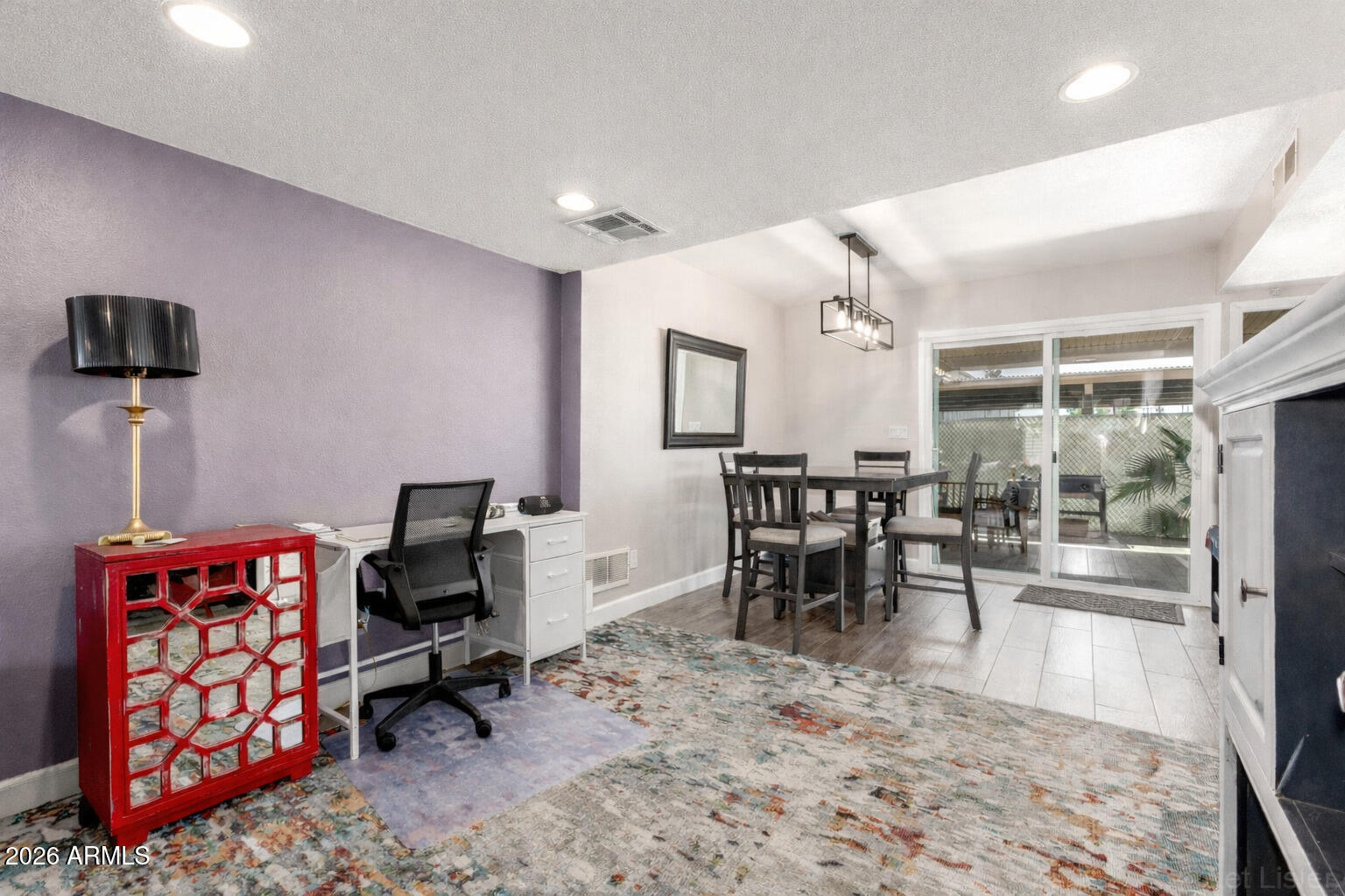 4923 North Granite Reef Road Scottsdale, AZ 85251 - Photo 6 of 28 a dining room with furniture and a floor to ceiling window