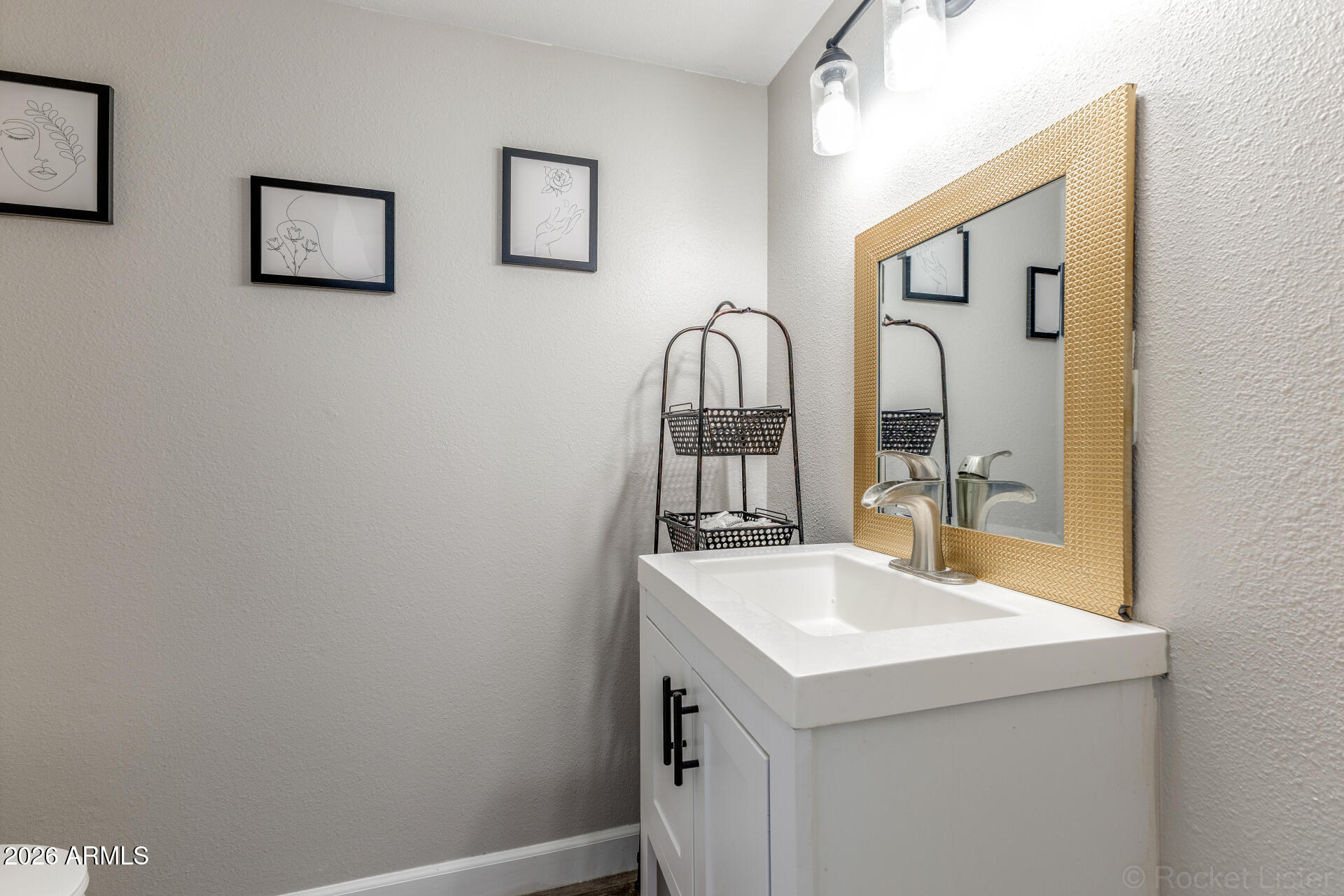 4923 North Granite Reef Road Scottsdale, AZ 85251 - Photo 10 of 28 a view of bathroom with dual sinks