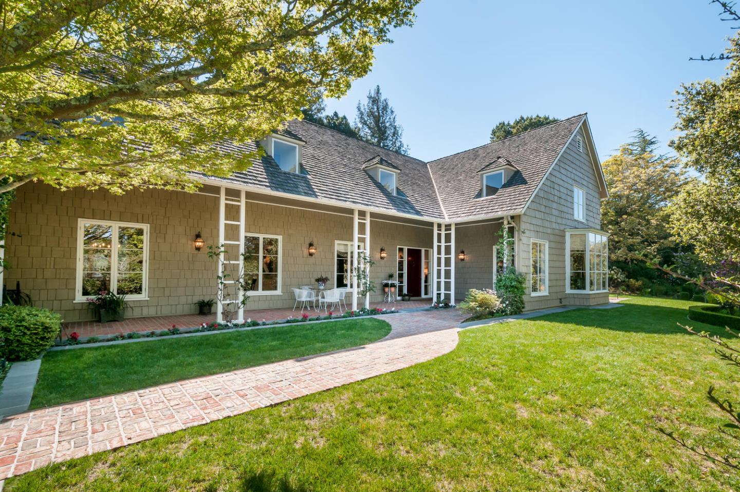 989 Hayne Road Hillsborough, CA 94010 - Photo 16 of 100 a front view of a house with a yard and patio