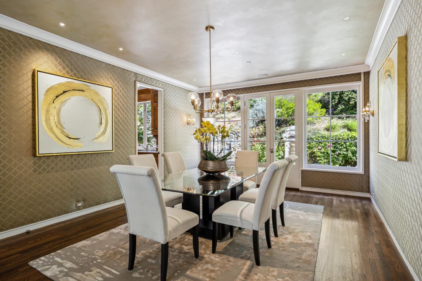 989 Hayne Road Hillsborough, CA 94010 - Photo 31 of 100 a dining room with furniture a chandelier and wooden floor