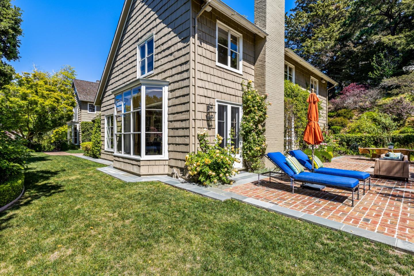 989 Hayne Road Hillsborough, CA 94010 - Photo 95 of 100 a view of a house with backyard and sitting area